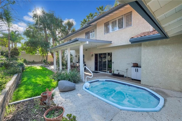 view of swimming pool featuring a patio area and fence