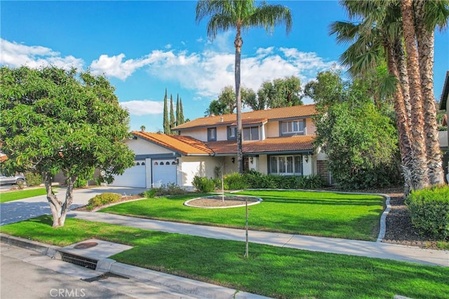1403 Blossom Ave, Redlands, CA 92373 - traditional-style home with driveway, an attached garage, a tile roof, a front yard, and stucco siding