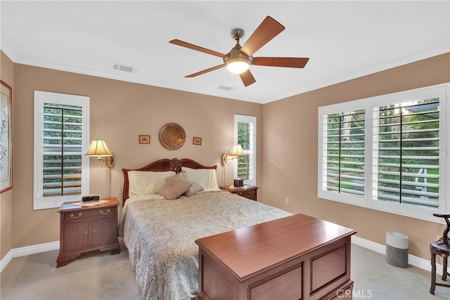 bedroom featuring visible vents, crown molding, baseboards, and multiple windows