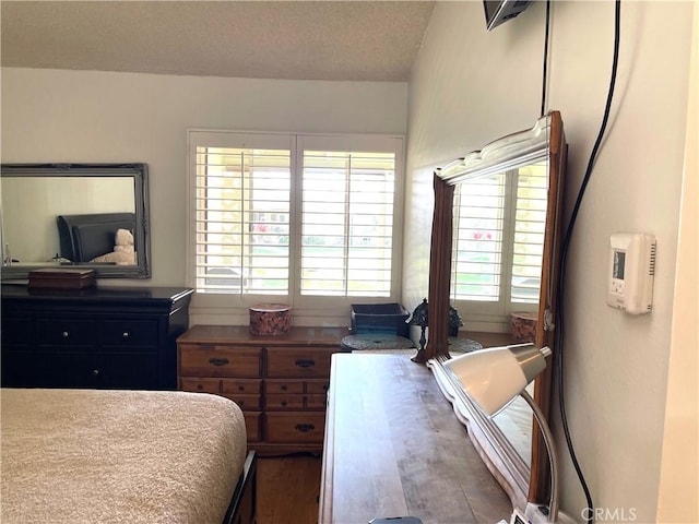 bedroom featuring a textured ceiling