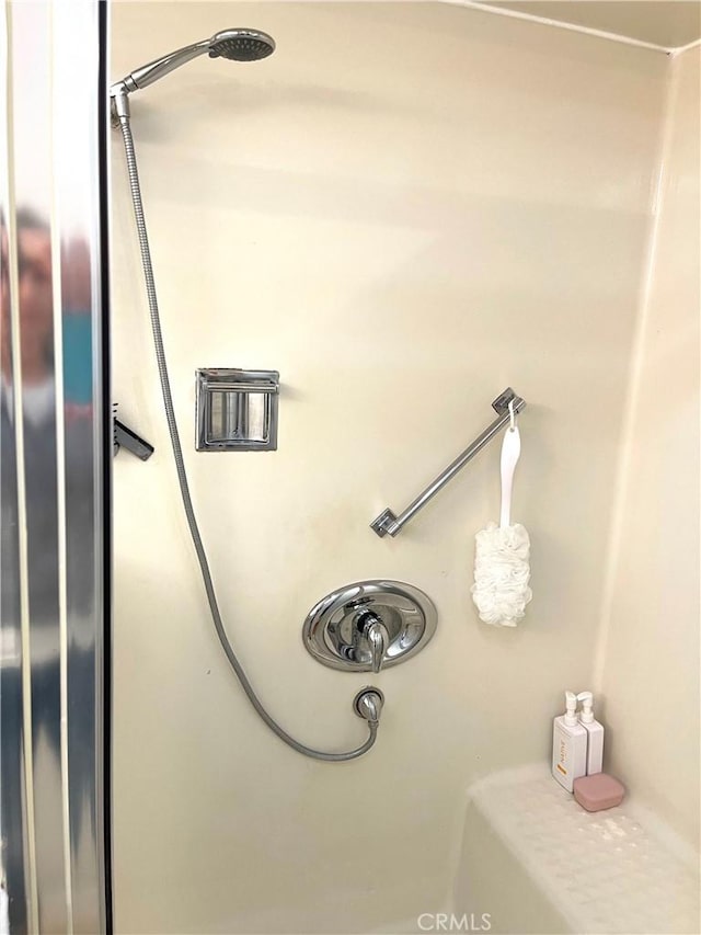 interior details with a shower