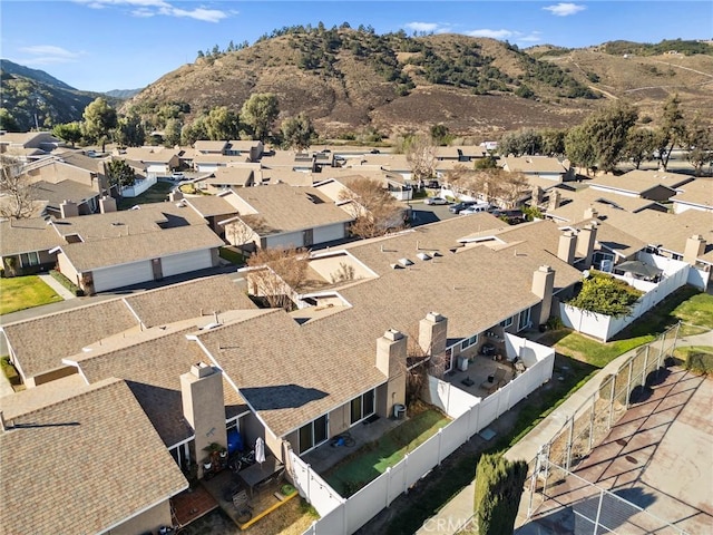 birds eye view of property with a residential view and a mountain view