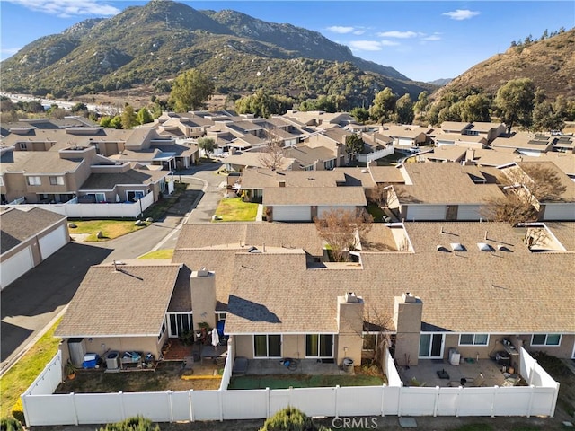 bird's eye view with a residential view and a mountain view