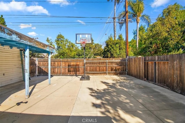 view of patio / terrace featuring fence