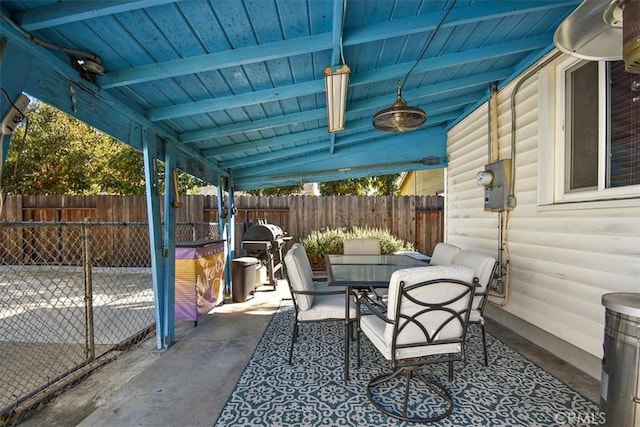 view of patio / terrace featuring outdoor dining space and fence private yard