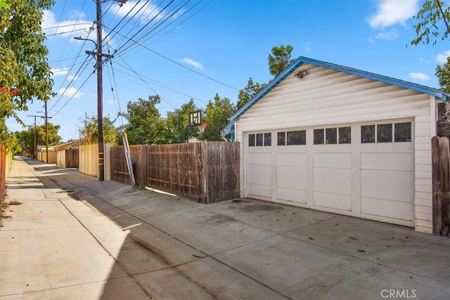 detached garage with fence