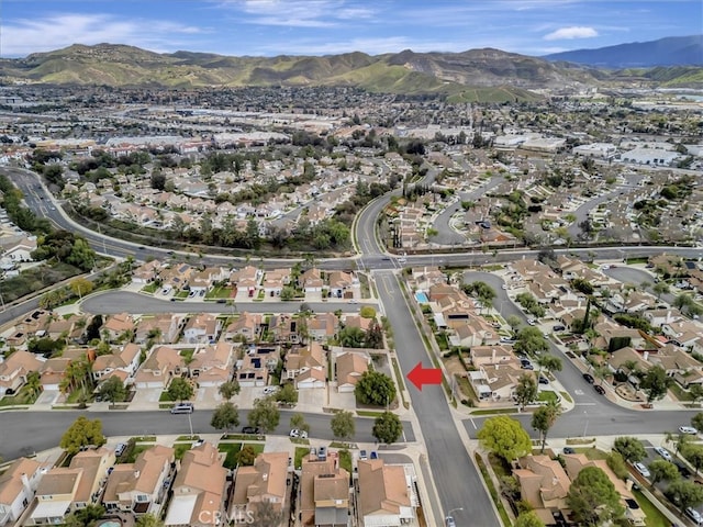 bird's eye view featuring a mountain view and a residential view