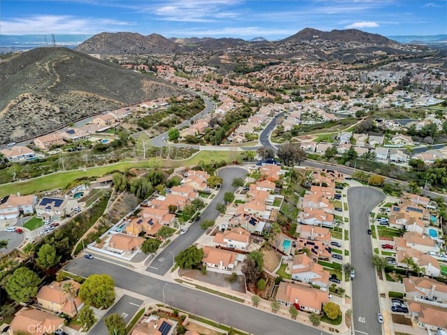 drone / aerial view with a mountain view and a residential view