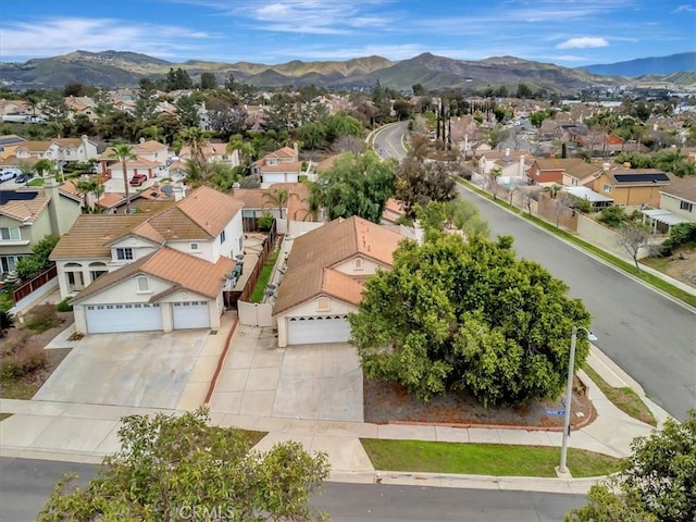 aerial view featuring a mountain view and a residential view