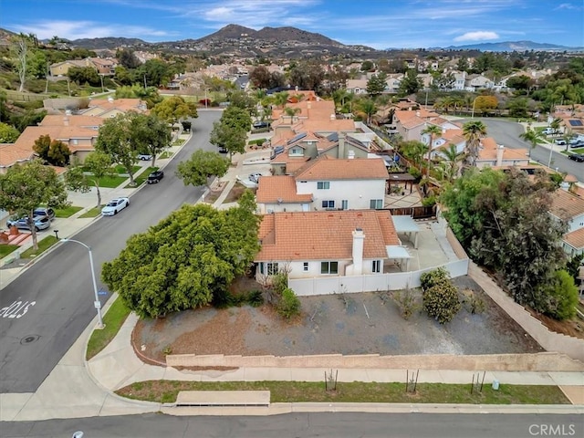 birds eye view of property featuring a residential view and a mountain view