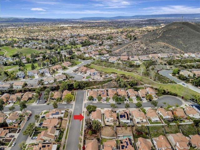 birds eye view of property with a residential view and view of golf course