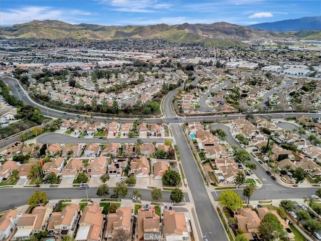 drone / aerial view with a residential view and a mountain view