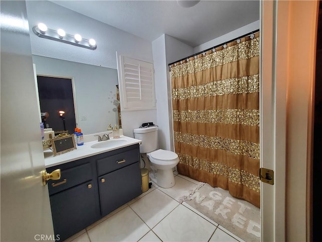 full bath featuring tile patterned flooring, a shower with curtain, toilet, and vanity