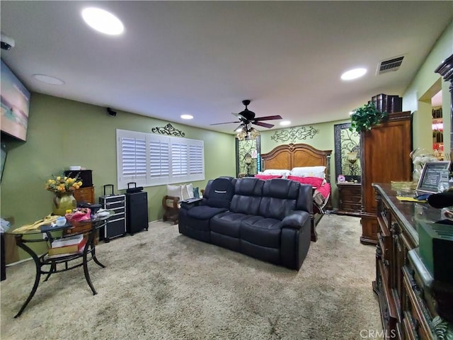 carpeted bedroom with visible vents, recessed lighting, and a ceiling fan