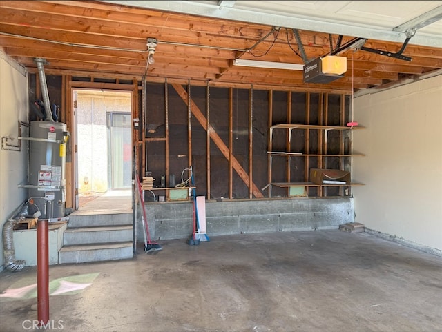 garage with water heater and a garage door opener