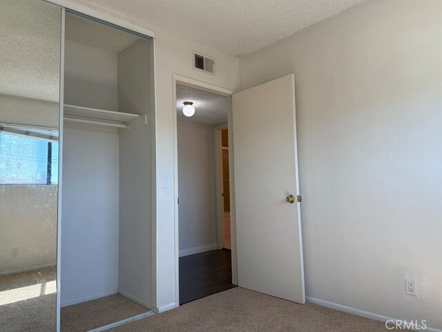 closet featuring visible vents