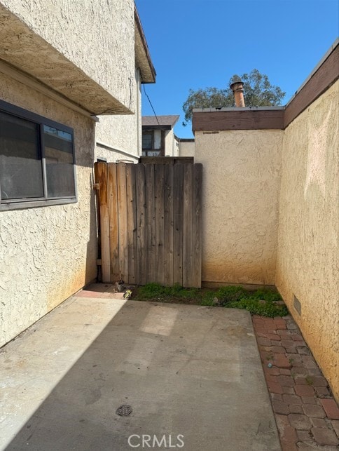 view of patio with fence