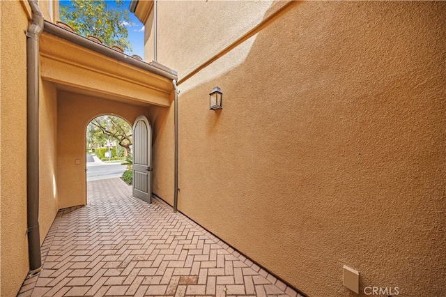 exterior space featuring stucco siding