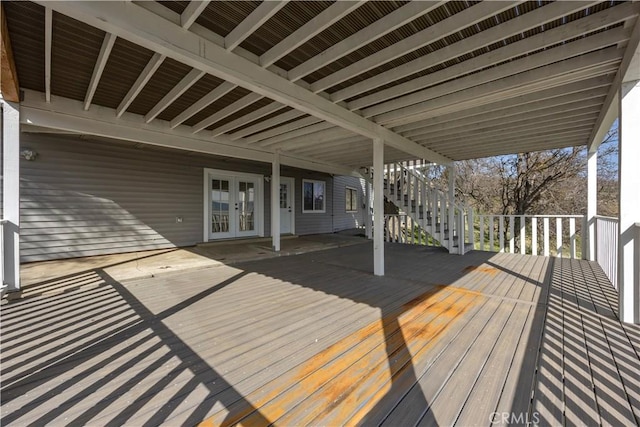 wooden deck featuring french doors and stairway