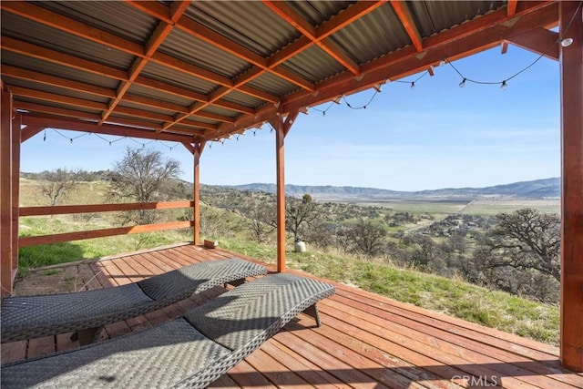 wooden terrace with a mountain view