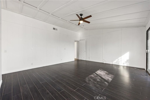 empty room with ceiling fan, wood finished floors, and visible vents