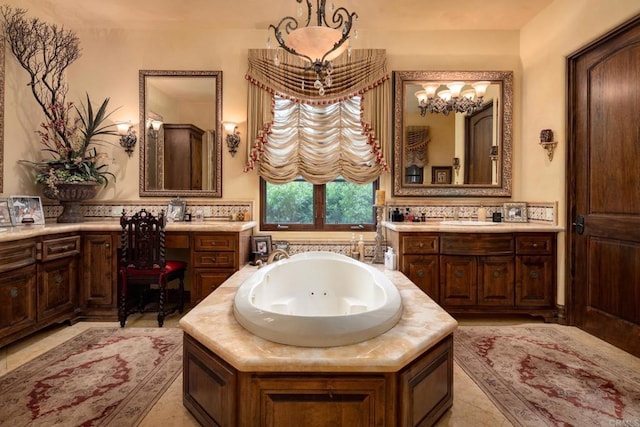 full bath featuring a jetted tub, tile patterned flooring, and vanity