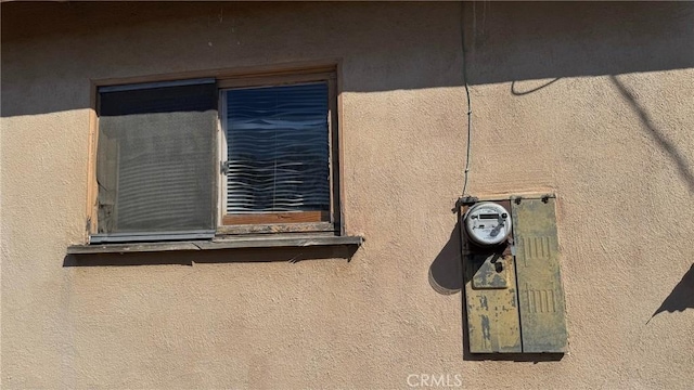 details featuring stucco siding