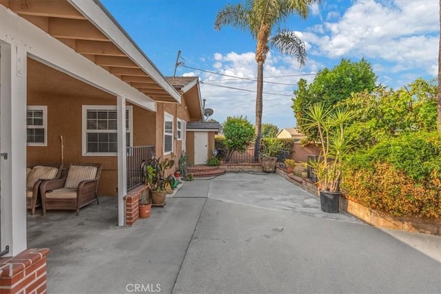 view of patio with fence