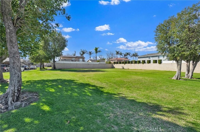 view of yard with fence