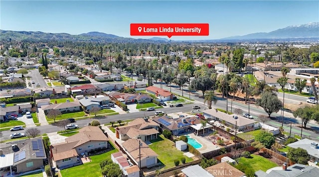 aerial view featuring a residential view and a mountain view