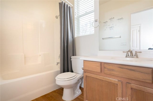 full bathroom with vanity, toilet, shower / bath combo with shower curtain, and wood finished floors