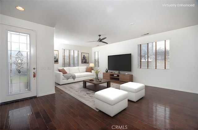 living room with a ceiling fan, visible vents, wood finished floors, baseboards, and recessed lighting