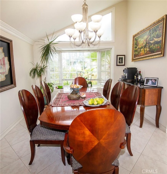 dining area with a chandelier, lofted ceiling, light tile patterned flooring, and ornamental molding