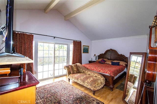 bedroom featuring vaulted ceiling with beams, access to outside, and wood finished floors