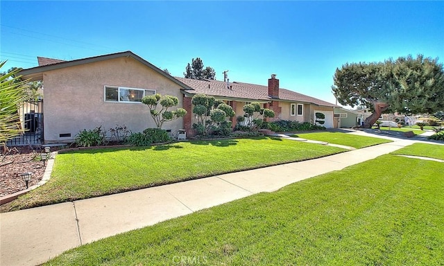 ranch-style house featuring stucco siding and a front yard