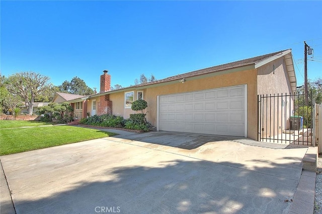 single story home with stucco siding, a front lawn, fence, concrete driveway, and a garage