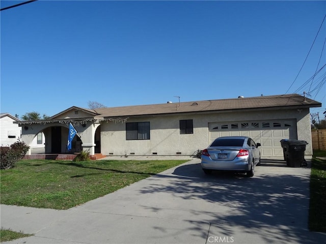 ranch-style home with a front yard, driveway, an attached garage, stucco siding, and crawl space