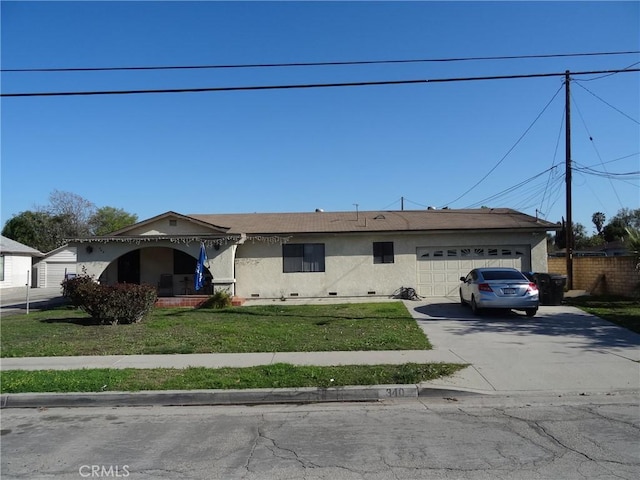 view of front of property featuring stucco siding, concrete driveway, a front yard, an attached garage, and crawl space