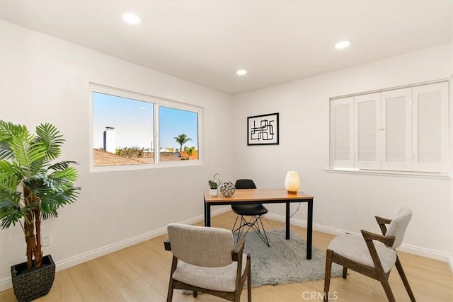 home office featuring recessed lighting, light wood-style flooring, and baseboards