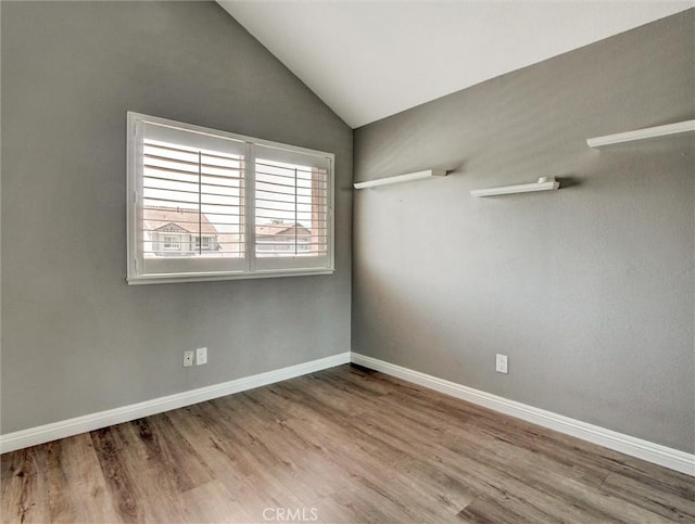 25547 Palermo Way, Yorba Linda, CA 92887 - unfurnished room with vaulted ceiling and wood finished floors