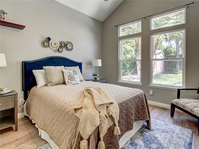 25547 Palermo Way, Yorba Linda, CA 92887 - bedroom featuring vaulted ceiling and wood finished floors
