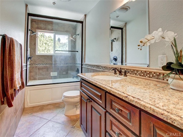 25547 Palermo Way, Yorba Linda, CA 92887 - full bath featuring vanity, enclosed tub / shower combo, tile patterned floors, decorative backsplash, and a textured wall