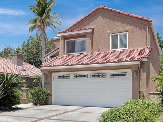 25547 Palermo Way, Yorba Linda, CA 92887 - mediterranean / spanish house featuring driveway, a tiled roof, an attached garage, and stucco siding