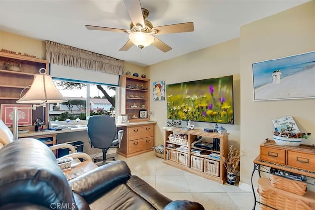 office space featuring light tile patterned flooring and a ceiling fan