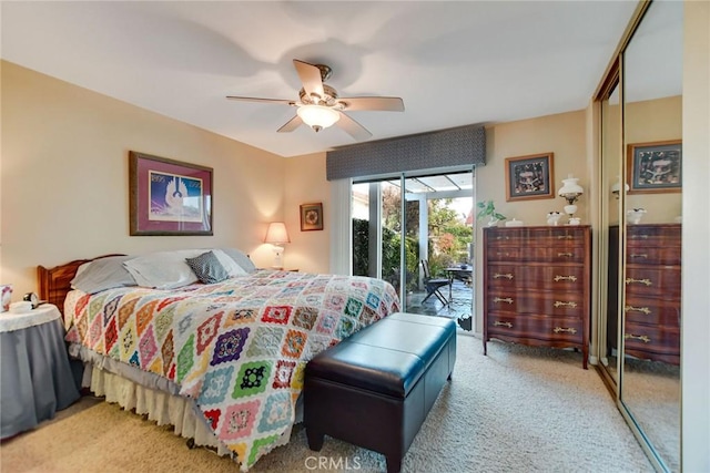 bedroom featuring a closet, a ceiling fan, carpet flooring, and access to outside