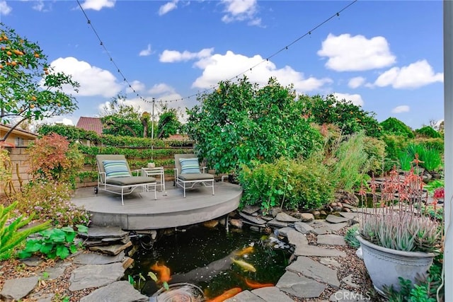 view of patio / terrace featuring fence