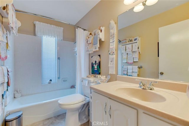 full bathroom featuring vanity, toilet, and shower / tub combo