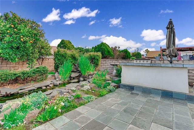 view of patio featuring a fenced backyard