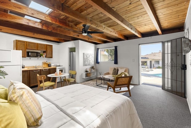 bedroom with beamed ceiling, access to exterior, wooden ceiling, and freestanding refrigerator