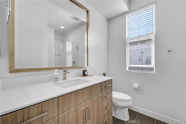 full bath with vanity, visible vents, a stall shower, tile patterned floors, and toilet